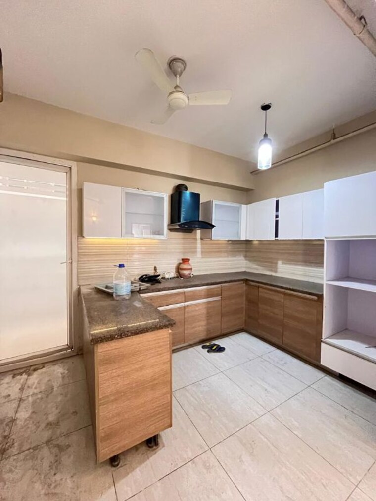 Kitchen, aba-cleo-county 3 Bedroom 1627 Sq.Ft. Apartment In Sector 121 Noida 10546756