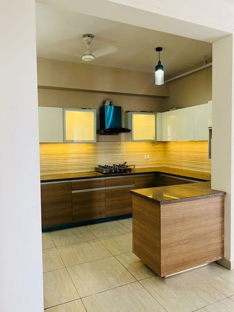 Kitchen, aba-cleo-county 3 Bedroom 1627 Sq.Ft. Apartment In Sector 121 Noida 10546756