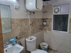 Bathroom in 2 BHK Apartment at Amrapali Kingswood, Sector 4 Greater Noida – for Rent