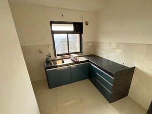 Kitchen in 2 BHK Apartment at Runwal Eirene, Balkum Pada – for Rent