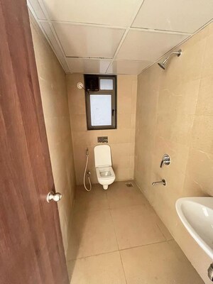 Bathroom in 2 BHK Apartment at Runwal Eirene, Balkum Pada – for Rent