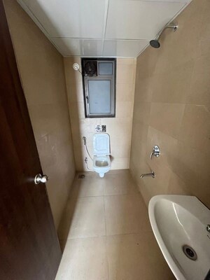 Bathroom in 2 BHK Apartment at Runwal Eirene, Balkum Pada – for Rent