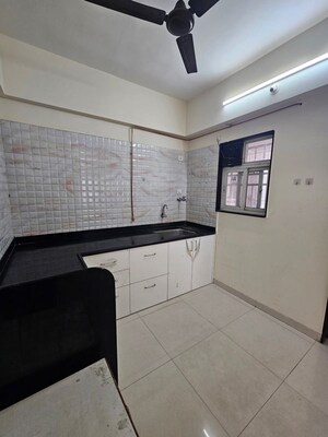 Kitchen in 2 BHK Apartment at Venkatesh Viraj Heights, Dhanori – for Rent