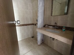 Bathroom in 2.5 BHK Apartment at Oberoi Realty Woods, Goregaon East – for Rent
