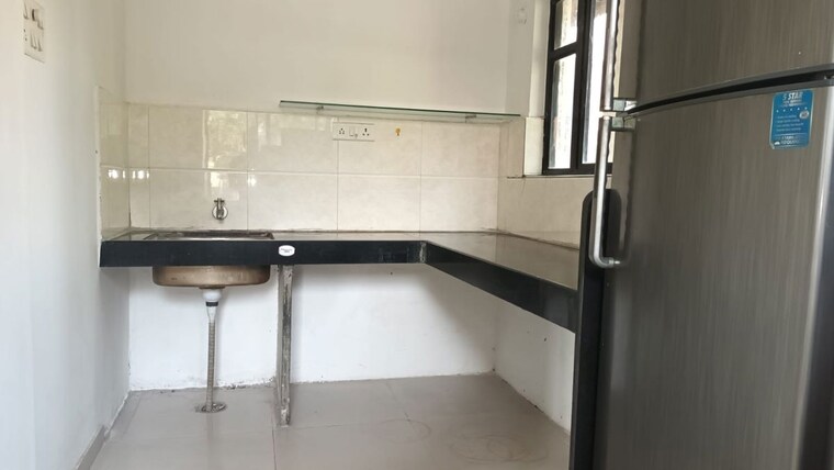 Kitchen, akash-sagar-classics 1 Bedroom 650 Sq.Ft. Apartment In Wadgaon Sheri Pune 10546893