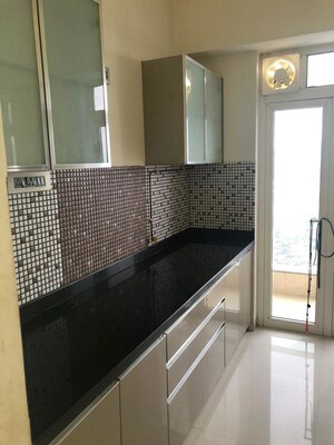 Kitchen in 3 BHK Apartment at Omkar Alta Monte, Malad East – for Rent