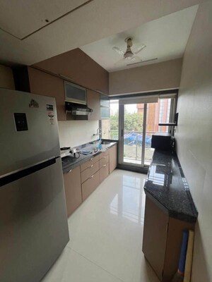 Kitchen in 1 BHK Apartment at Kasam Eucalyptus, Manpada – for Rent