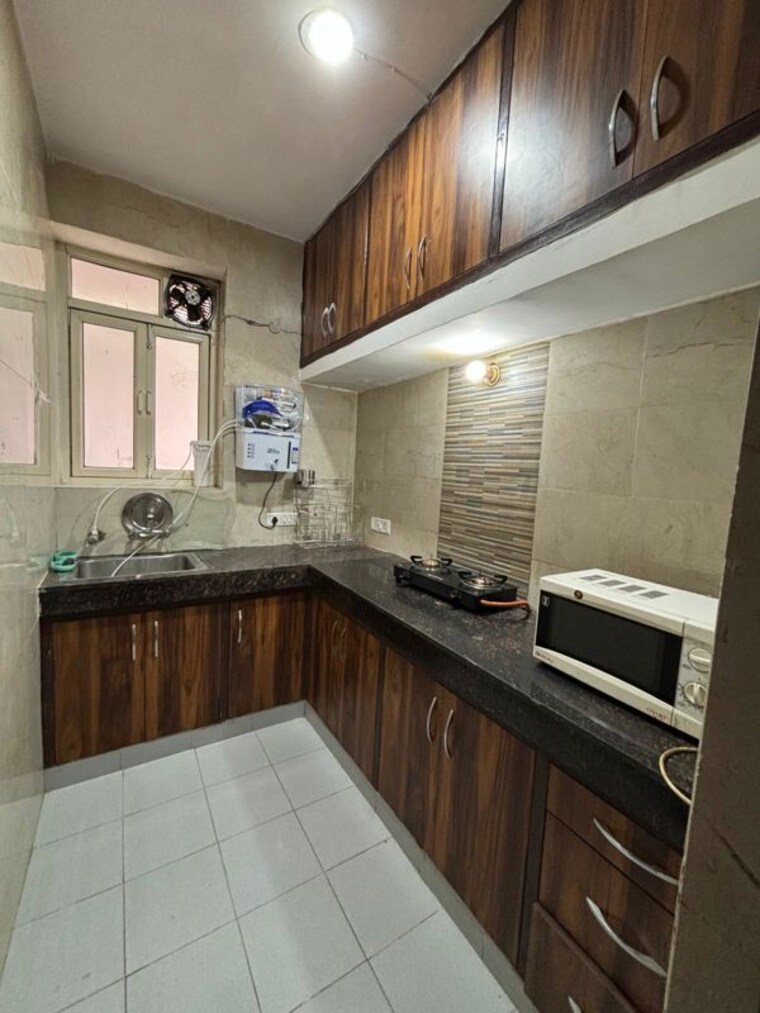 Kitchen, dlf-independent-floors 2.5 Bedroom 340 Sq.Ft. Apartment In Dlf City Phase 3 Gurgaon 10547045