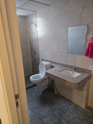 Bathroom in 3 BHK Builder Floor at Smart World Orchard, Sector 61 – for Sale