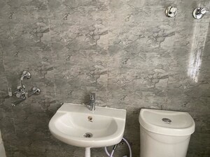 Bathroom in 2.5 BHK Apartment at Galaxy Royale, Gaur City 2 – for Rent