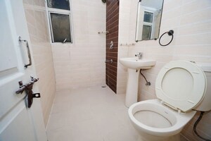 Bathroom in 2 BHK Apartment at Amrapali Zodiac, Sector 120 – for Sale