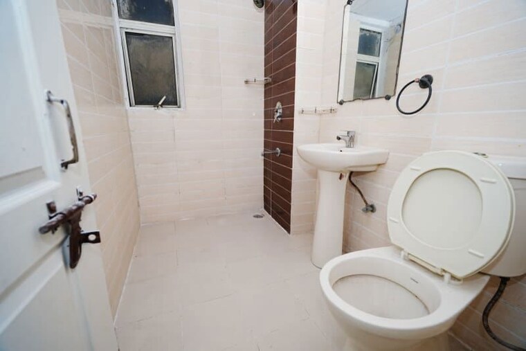 Bathroom, amrapali-zodiac 2 Bedroom 950 Sq.Ft. Apartment In Sector 120 Noida 10547110
