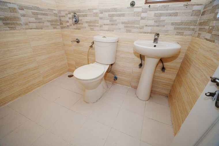 Bathroom, amrapali-zodiac 2 Bedroom 950 Sq.Ft. Apartment In Sector 120 Noida 10547110