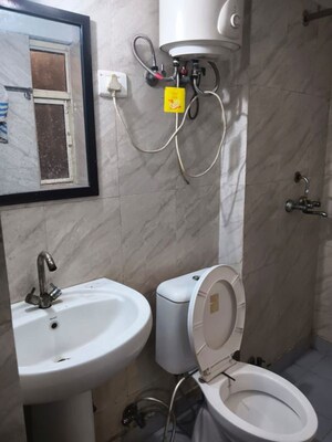 Bathroom in 3 BHK Apartment at Gardenia Golf City, Sector 75 – for Rent