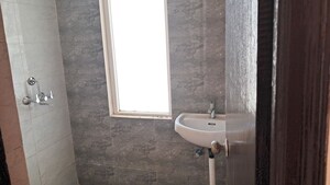 Bathroom in 2.5 BHK Apartment at Amrapali Silicon City, Sector 76 – for Sale