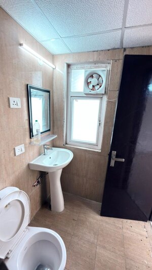 Bathroom in 3 BHK Apartment at Amrapali Silicon City, Sector 76 – for Rent