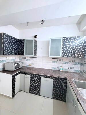 Kitchen in 3 BHK Apartment at Hawelia Valencia Homes, Sector 1 Greater Noida – for Rent