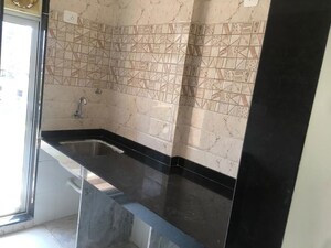 Kitchen in 2 BHK Apartment at Anant Metropolis Insignia Towers, Kasarvadavali – for Rent