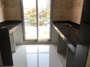 Kitchen in 2 BHK Apartment at Anant Metropolis Insignia Towers, Kasarvadavali – for Rent