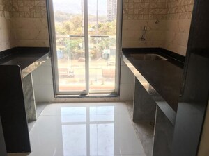 Kitchen in 2 BHK Apartment at Anant Metropolis Insignia Towers, Kasarvadavali – for Rent