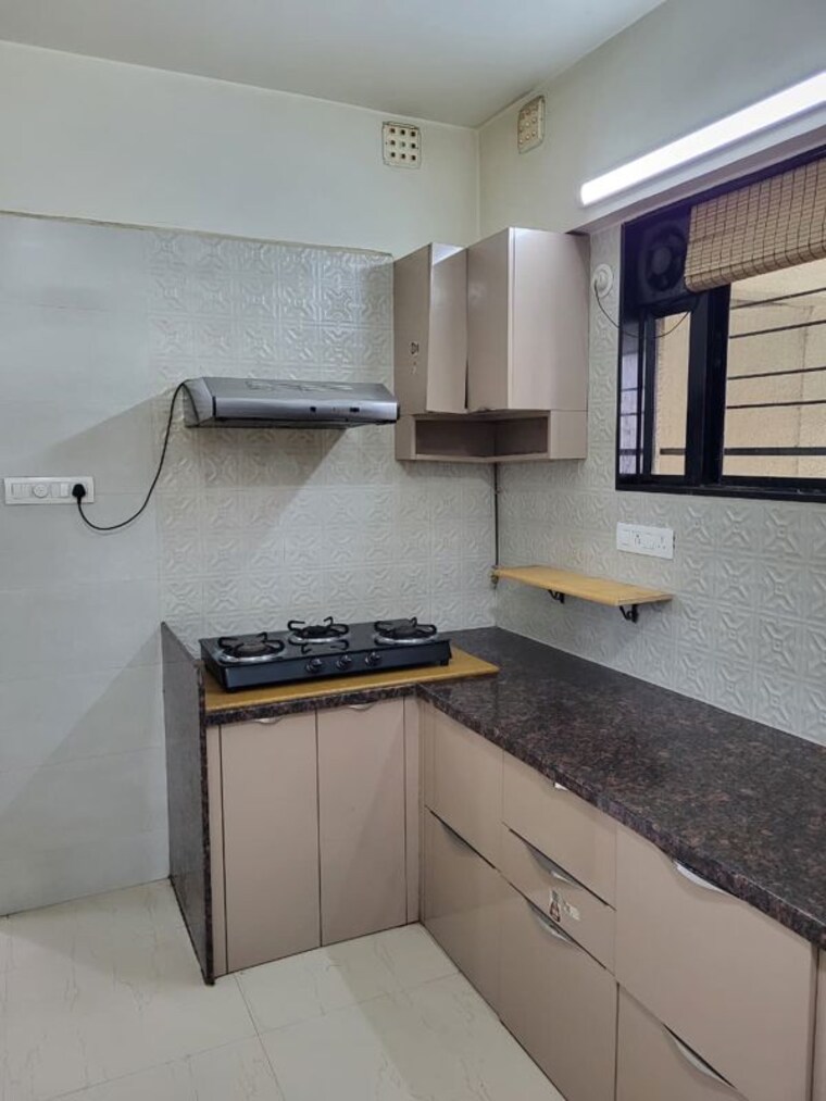 Kitchen, mahindra-lifespaces-the-woods 3 Bedroom 1200 Sq.Ft. Apartment In Wakad Pune 10547204