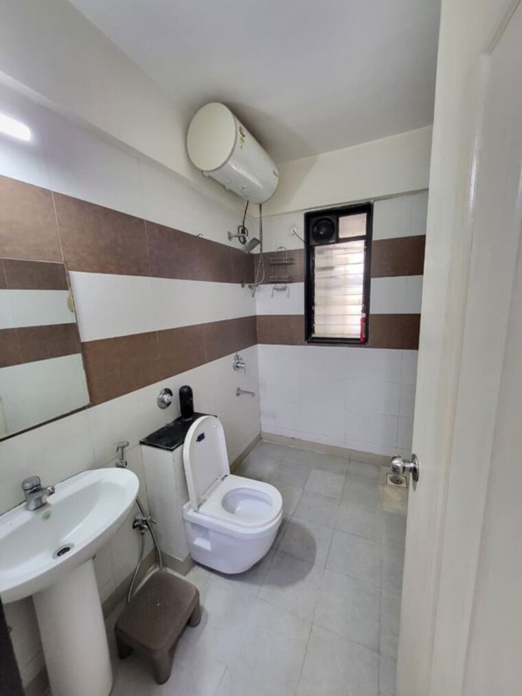 Bathroom, mahindra-lifespaces-the-woods 3 Bedroom 1200 Sq.Ft. Apartment In Wakad Pune 10547204