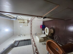 Bathroom in 2 BHK Apartment at Sunshree Gold, Nibm Road – for Rent