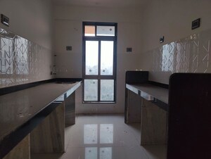 Kitchen in 2 BHK Apartment at Shiv Shakti Tower 28, Malad East – for Sale