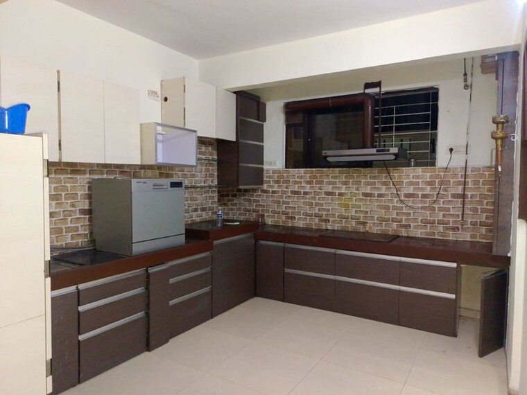 Kitchen, mainland-camelot-royale 2 Bedroom 1675 Sq.Ft. Apartment In Viman Nagar Pune 10547479