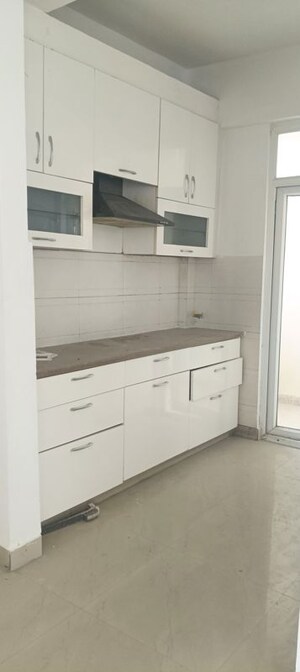 Kitchen in 2 BHK Apartment at Sikka Karnam Greens, Sector 143b – for Rent
