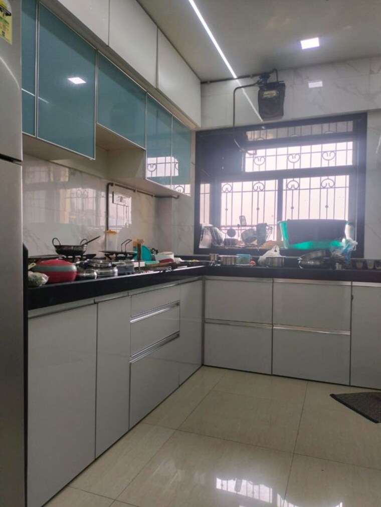 Kitchen, runwal-garden-city 3 Bedroom 900 Sq.Ft. Apartment In Balkum Pada Thane 10547535