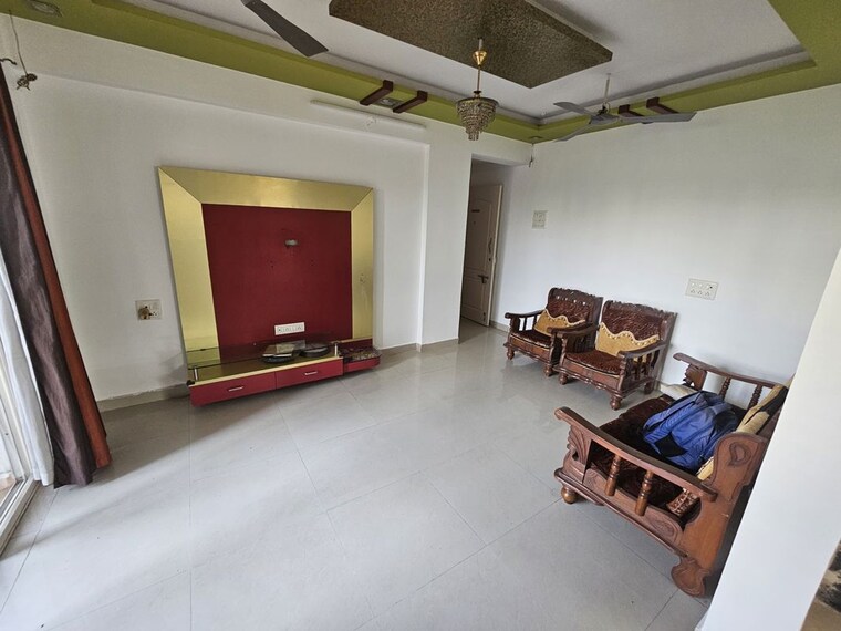 Living Room, aishwaryam-greens-co-operative-housing-society 3 Bedroom 1200 Sq.Ft. Apartment In Wakad Pune 10547559