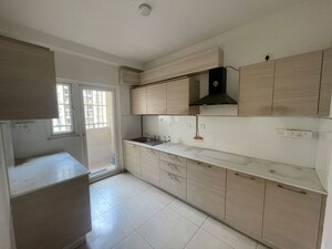 Kitchen in 3 BHK Apartment at Prestige Pine Wood, Koramangala – for Sale