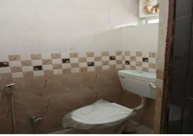Bathroom, mangalam-apartment-noida 1 Bedroom 500 Sq.Ft. Apartment In Khora Noida 10547639