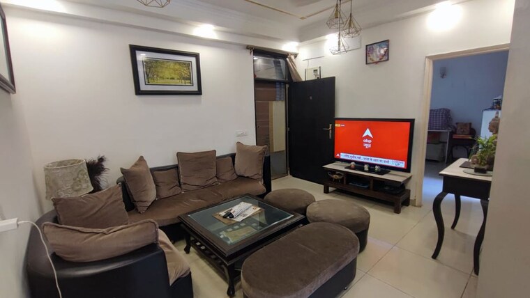 Living Room, ajnara-le-garden 3 Bedroom 1245 Sq.Ft. Apartment In Sector 16b Greater Noida Greater Noida 10547671