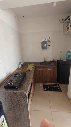 Kitchen in 2 BHK Apartment at Border Road Housing Society, Dhanori – for Rent