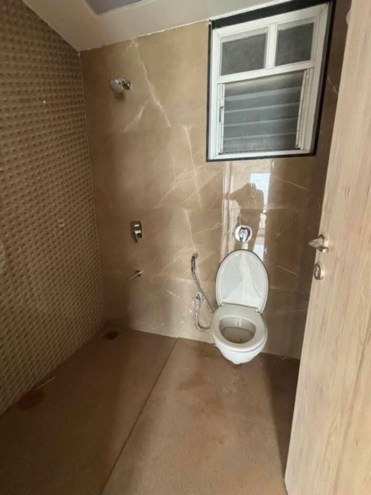 Bathroom, border-road-housing-society 2 Bedroom 1050 Sq.Ft. Apartment In Dhanori Pune 10547799
