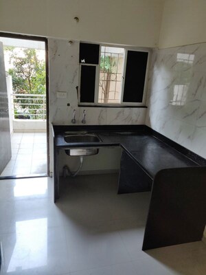 Kitchen in 1 BHK Apartment at Pride Silver Oak, Rahatani – for Sale