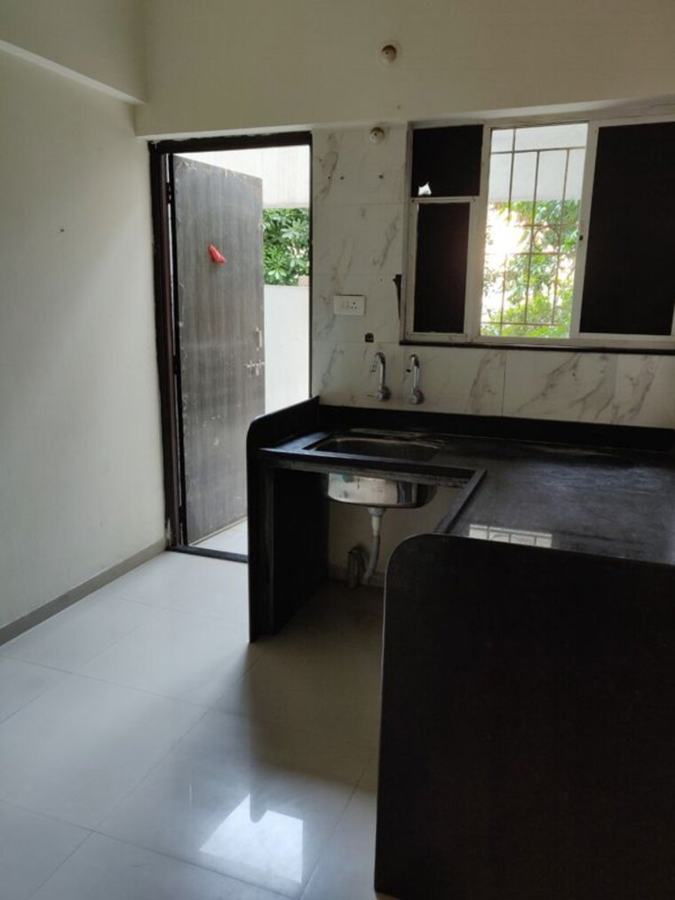 Kitchen, pride-silver-oak 1 Bedroom 525 Sq.Ft. Apartment In Rahatani Pune 10547830