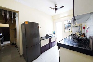 Kitchen in 1 BHK Apartment at Surya Vaibhav, Thergaon – for Sale