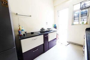 Kitchen in 1 BHK Apartment at Surya Vaibhav, Thergaon – for Sale