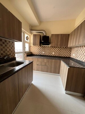 Kitchen in 3 BHK Apartment at Adani M2K Oyster Grande, Sector 102 – for Sale