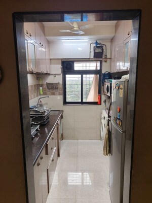 Kitchen in 3 BHK Apartment at Ashish Garden Estate, Goregaon West – for Sale