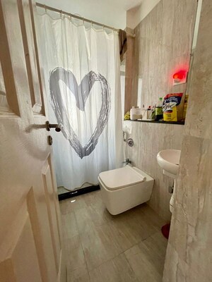 Bathroom in 2 BHK Apartment at Divine Aspen Garden, Goregaon East – for Rent