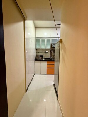 Building Lobby in 2 BHK Apartment at Lalani Grandeur, Goregaon East – for Rent