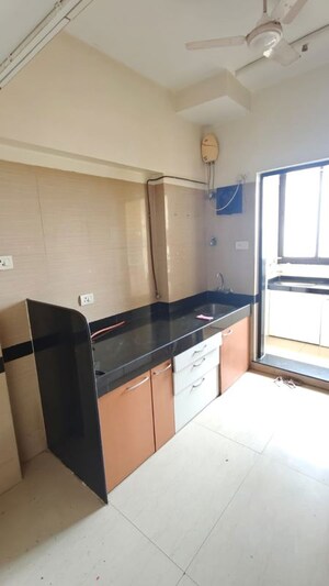 Kitchen in 2 BHK Apartment at K Raheja Heights, Malad East – for Rent