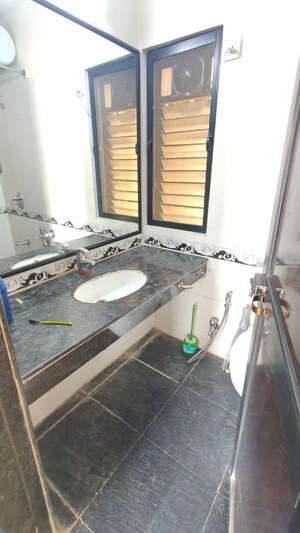 Bathroom in 2 BHK Apartment at K Raheja Heights, Malad East – for Rent