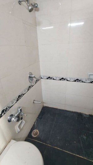 Bathroom in 2 BHK Apartment at K Raheja Heights, Malad East – for Rent