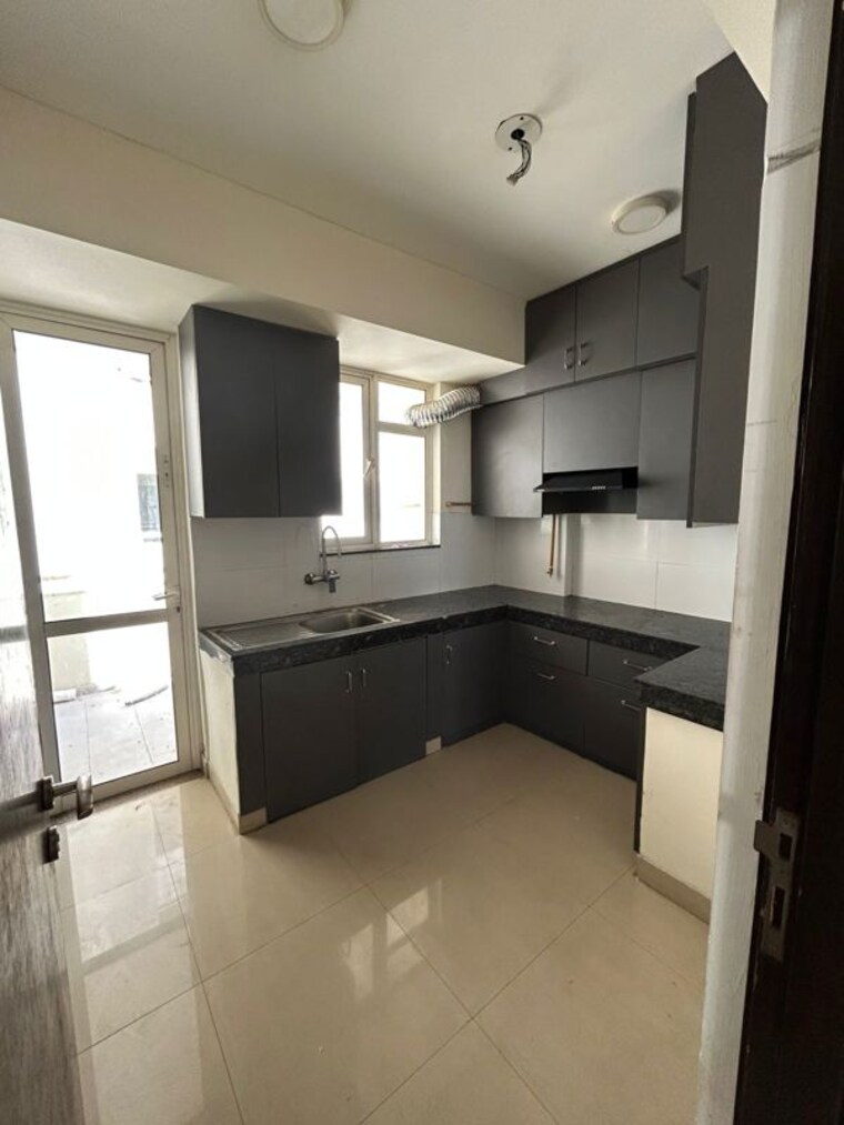 Kitchen, eldeco-live-by-the-greens 2 Bedroom 1136 Sq.Ft. Apartment In Sector 150 Noida 10548167