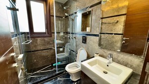Bathroom in 4 BHK Apartment at Hauz Khas Enclave – for Rent